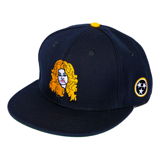 Dolly Parton hat, side view with yellow Dolly Parton embroidery on navy blue snapback