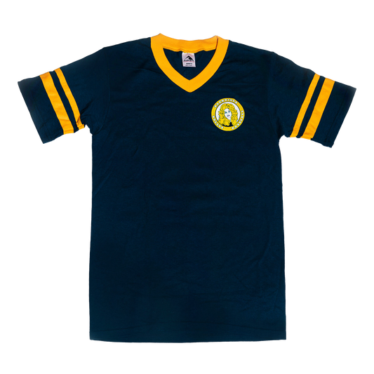 Front view of Gameday Tee with Dolly Parton logo and yellow striped sleeves.