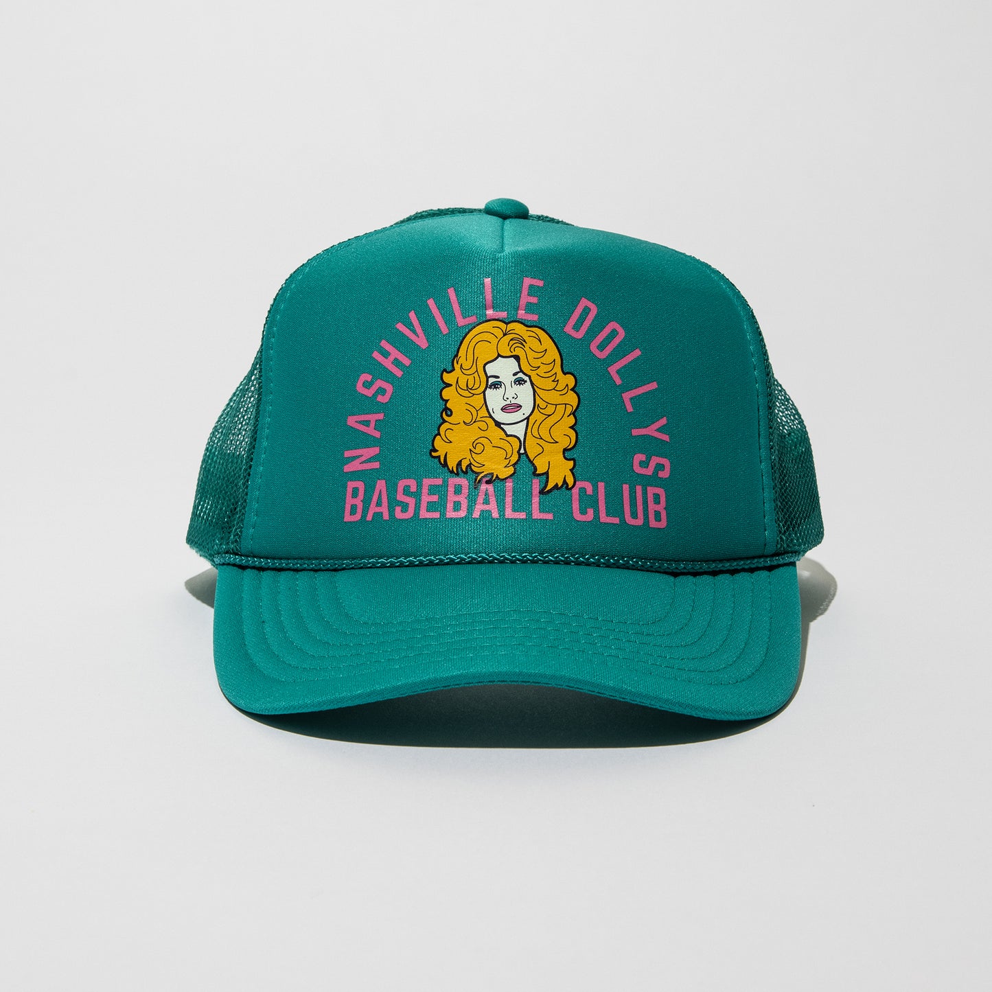 Front view of Dolly Parton face logo Nashville Dollys Baseball Club retro trucker hat in seafoam teal green with mesh back and rope detail.